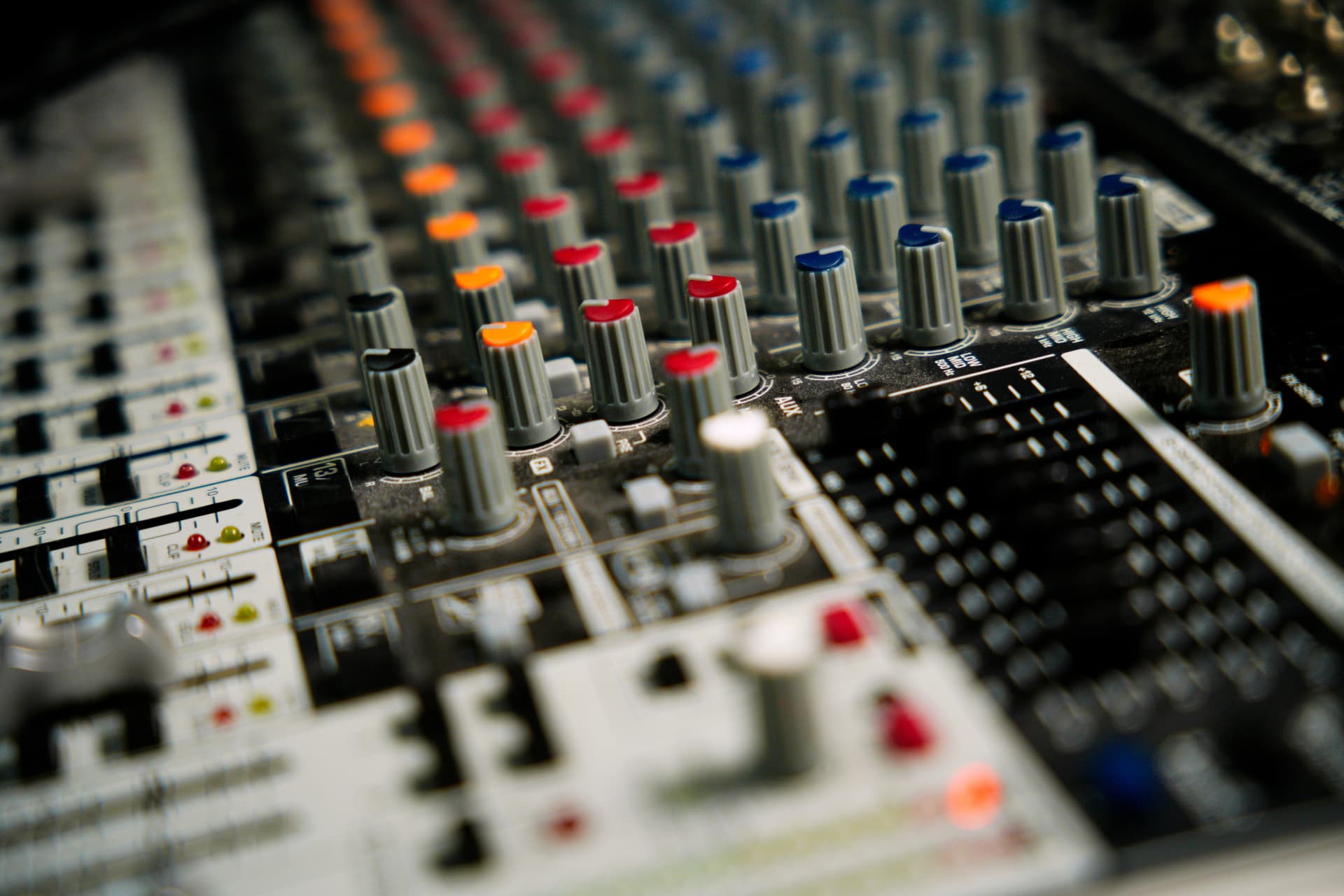 Close-up of a professional audio mixing desk